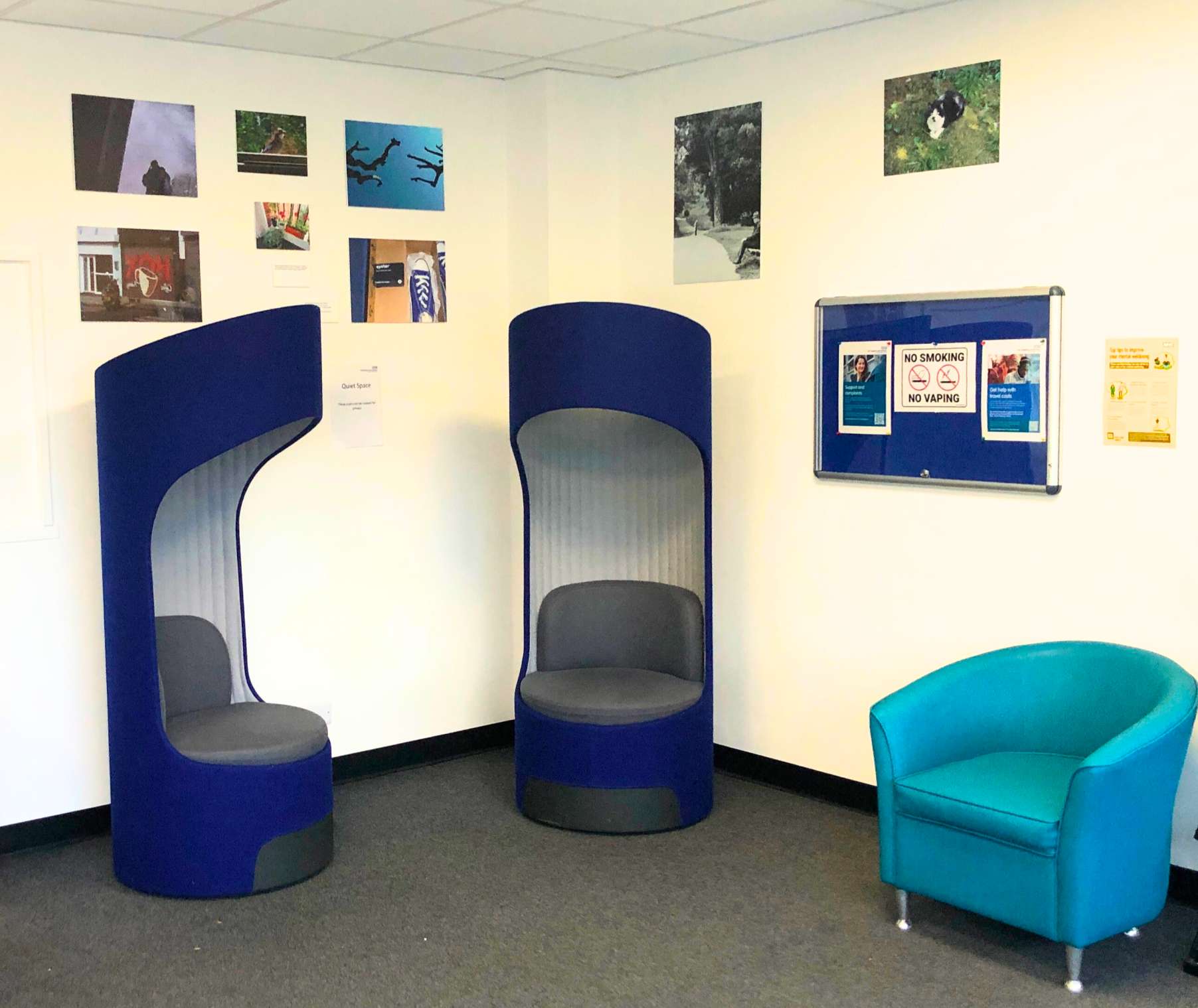 Adult waiting room with new art work displayed.